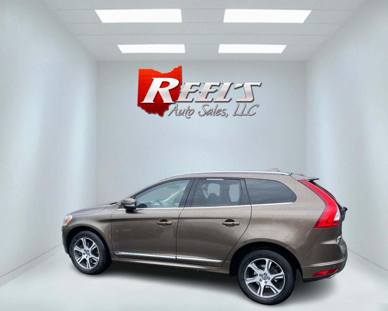 2015 Brown /Tan Volvo XC60 T6 Premium Plus (YV4902RC5F2) with an 3.0L I6 24V DOHC Turbo engine, 6-Speed Automatic transmission, located at 11115 Chardon Rd. , Chardon, OH, 44024, (440) 214-9705, 41.580246, -81.241943 - Photo#10